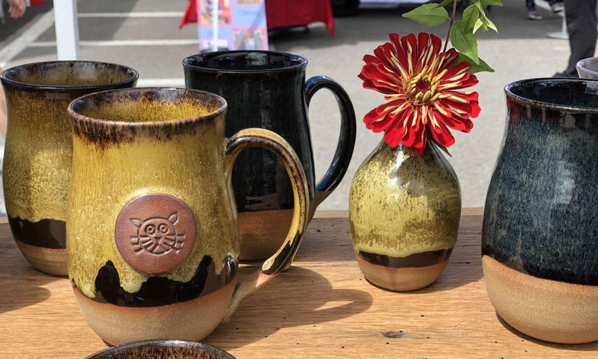 Collection of mugs and vases at the craft market