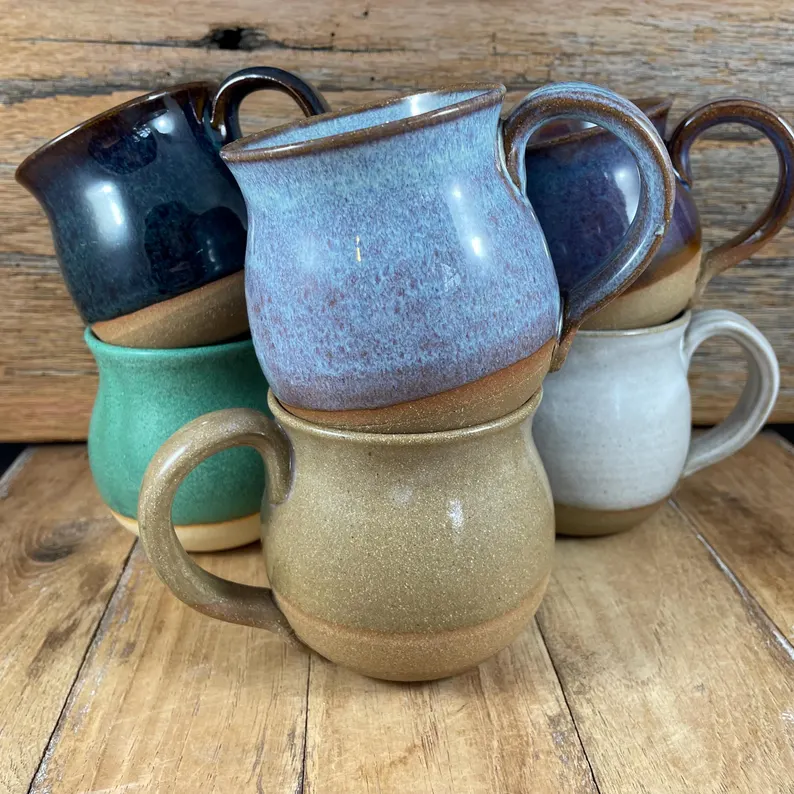 Collection of mugs in all six glaze colors
